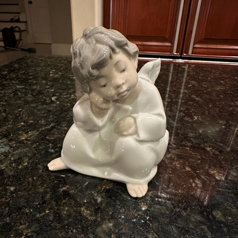 Lladro “Angel Thinking Boy”